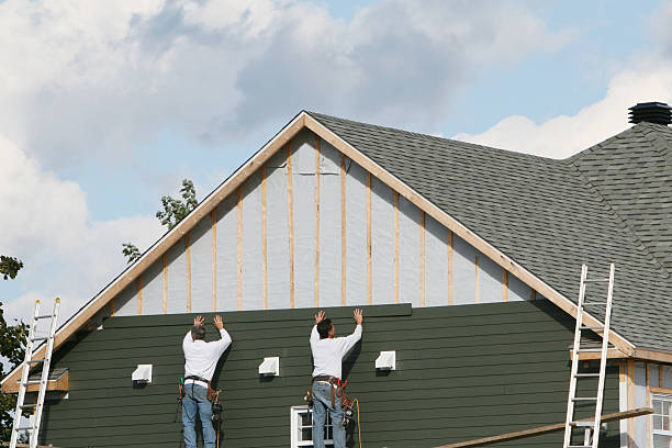 Professional Siding Contractor technician working in Dobson, NC
